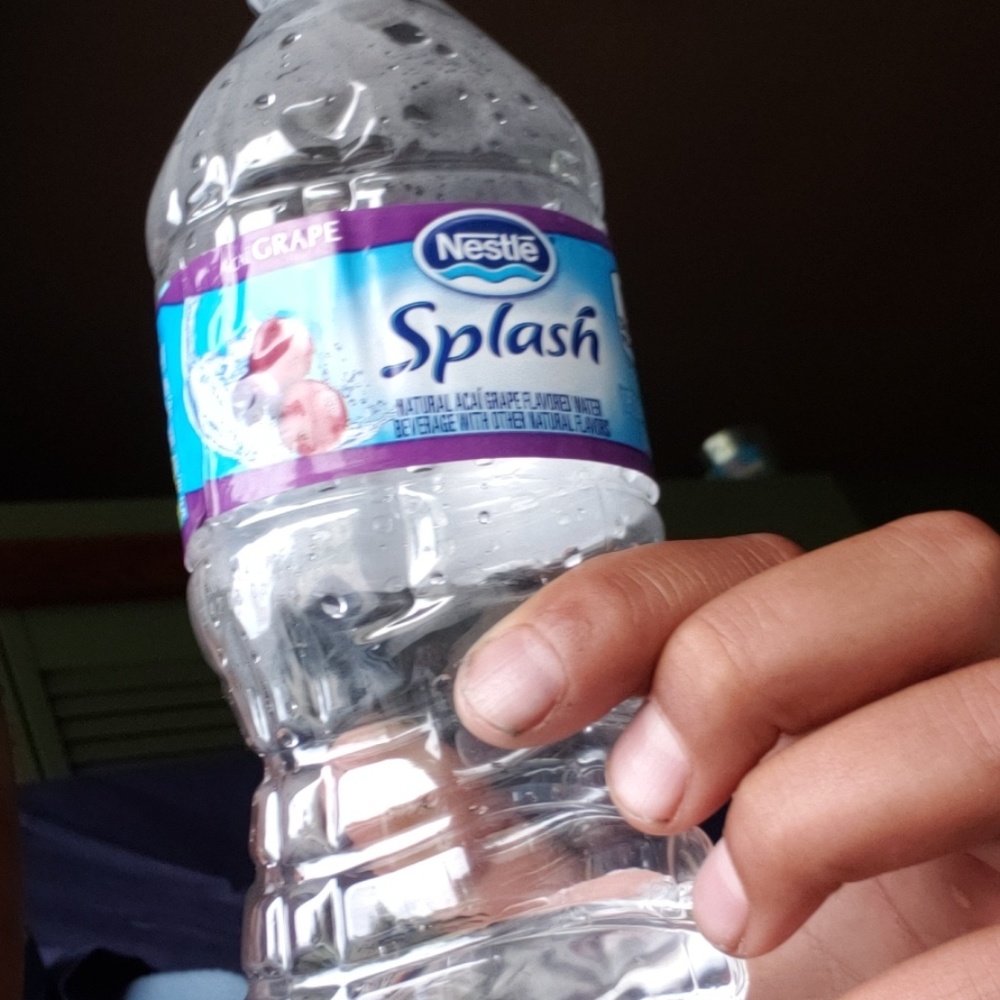 A water bottle with sone water in it